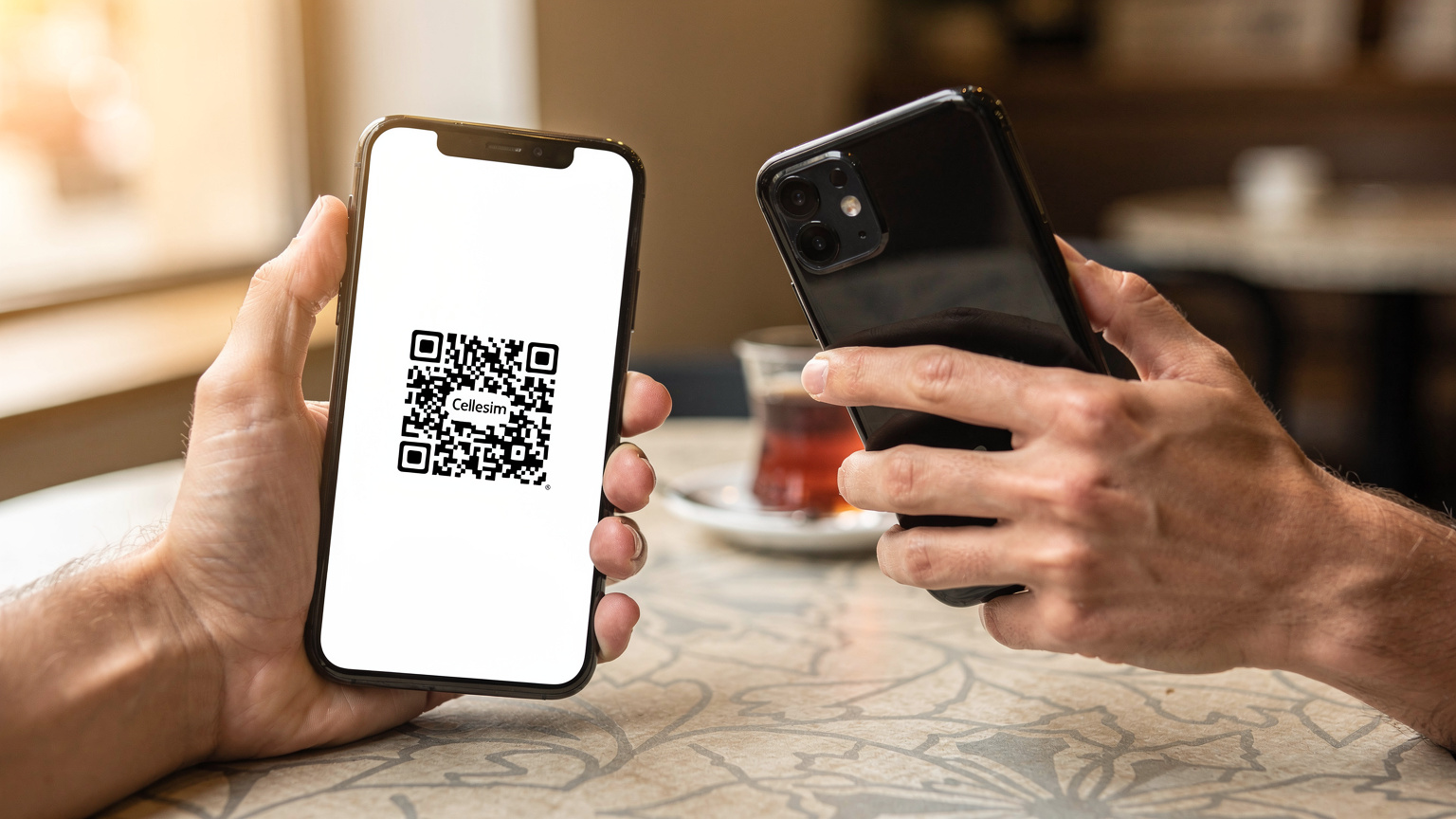 A close-up of a traveler's hand holding a smartphone, with a Cellesim QR code being scanned on another device, showing the smooth, digital activation process.