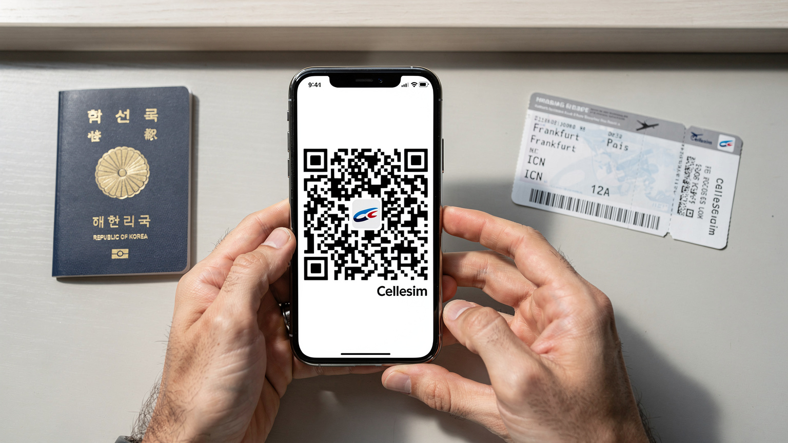 스마트폰 화면에 Cellesim eSIM QR 코드가 표시된 모습. 옆에는 여권과 항공권이 놓여 있어 여행 준비 중임을 암시한다.