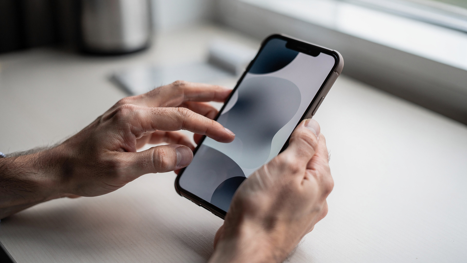 A business traveler seamlessly managing their eSIM on a smartphone, indicating easy activation and control over their data plan.